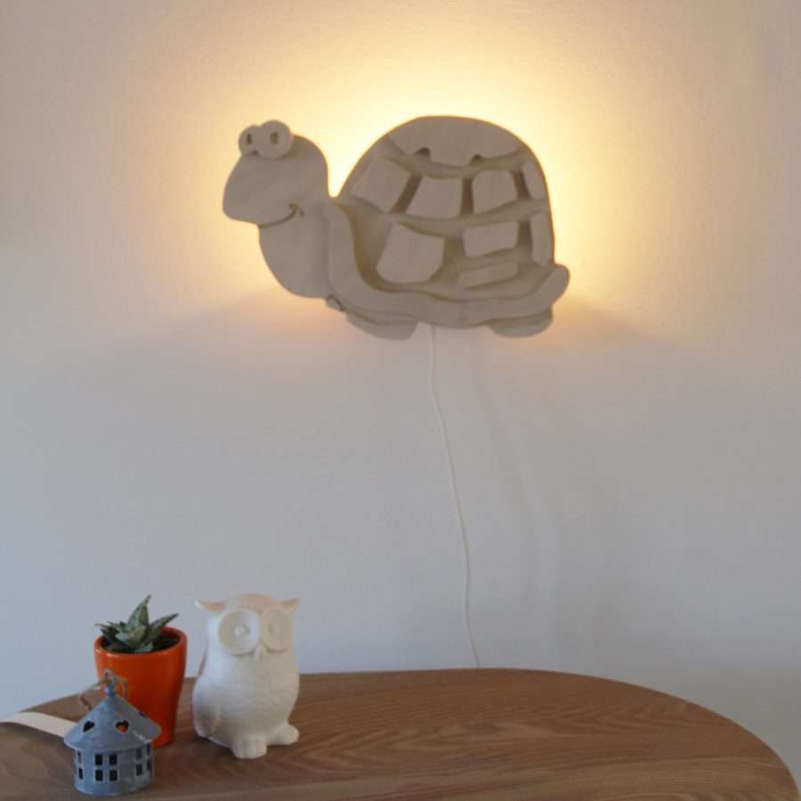 Wandlamp schildpad geeft sfeer